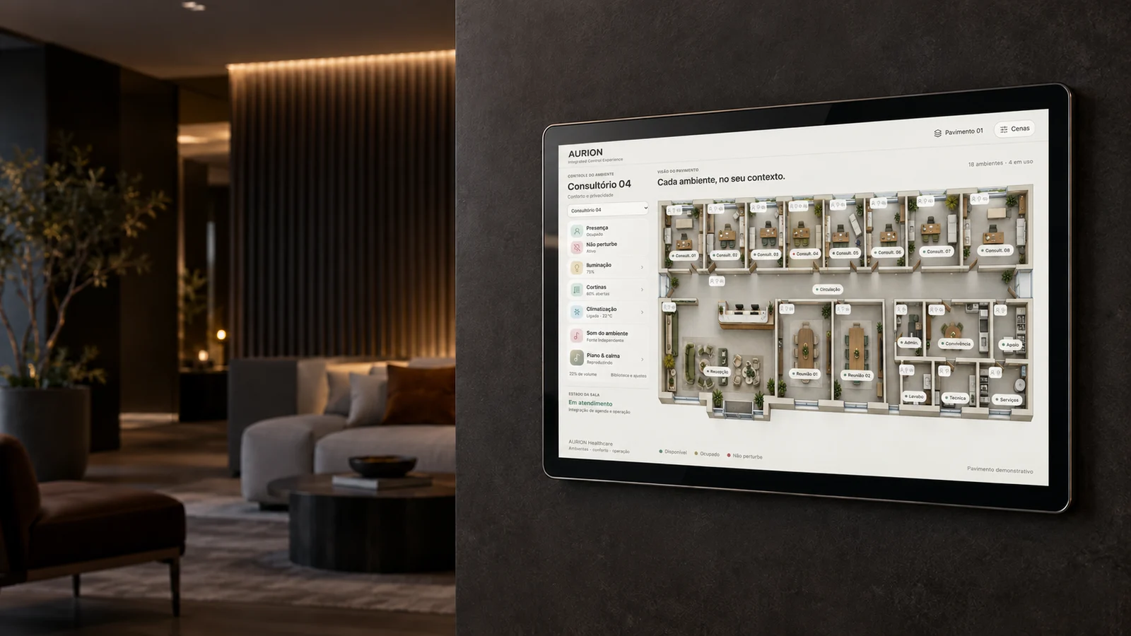 Visualização do painel físico AURION Touch com a interface AURION OS e a planta de um pavimento